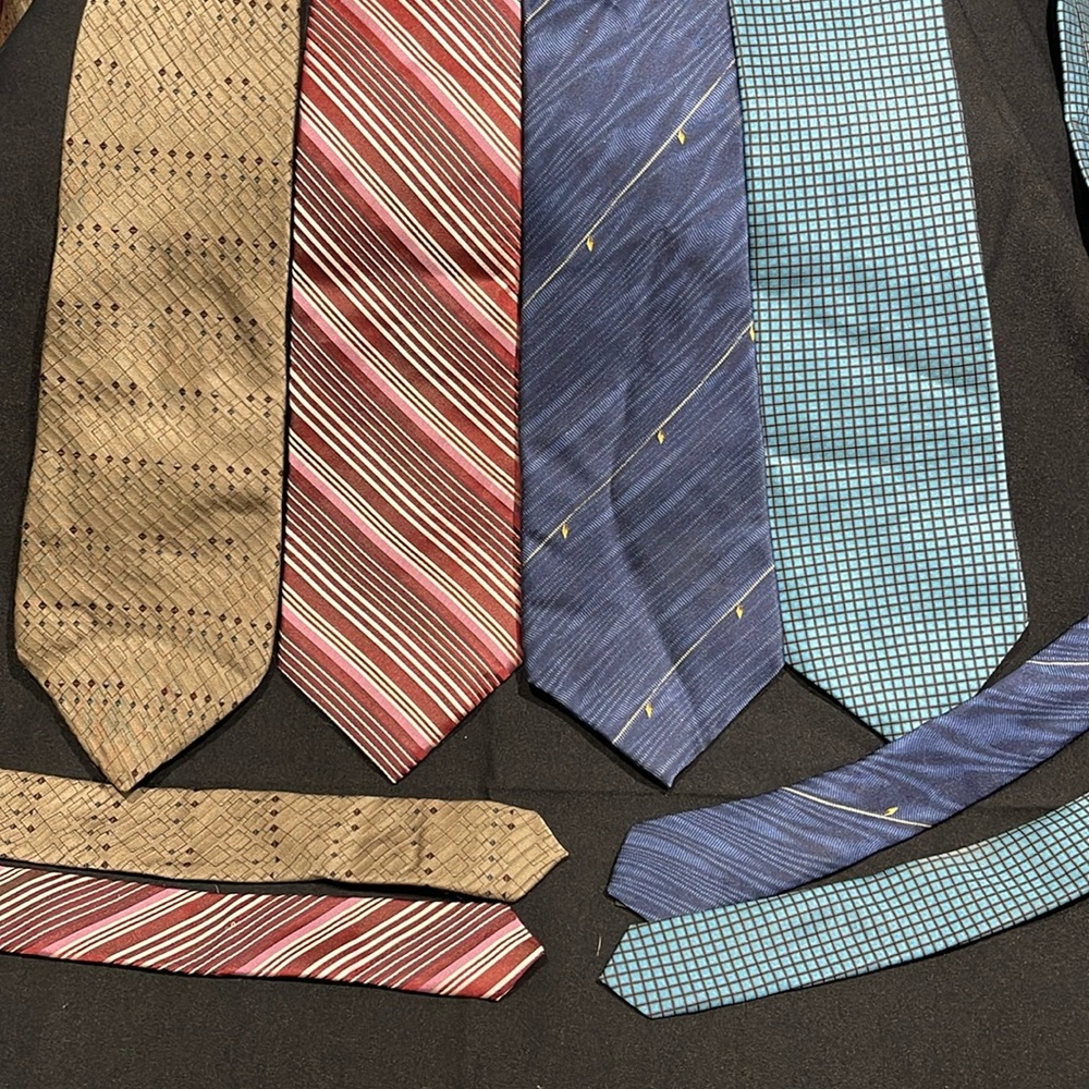 Four DKNY neckties.
